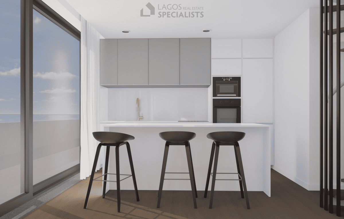 sleek Bosch-fitted kitchen with island in new build 2-bedroom apartment Lagos