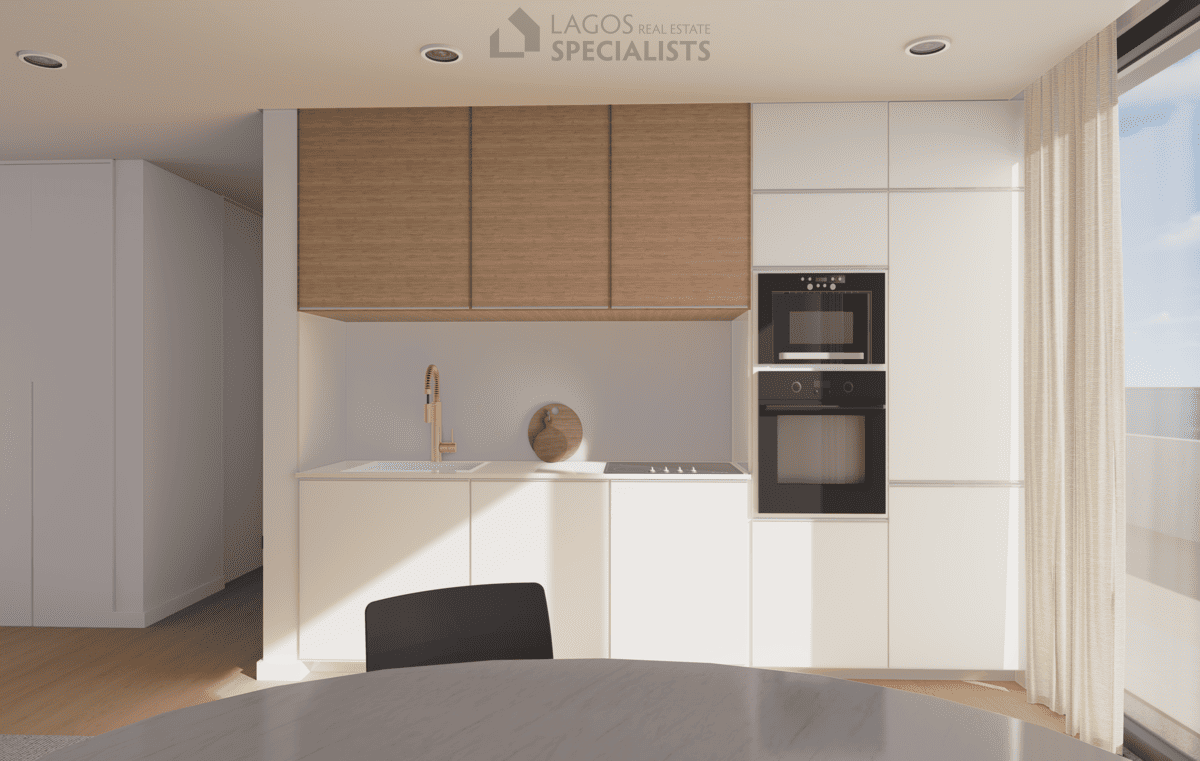 fitted Bosch kitchen with wood accents and Silestone counters in new build 1-bedroom Lagos apartment