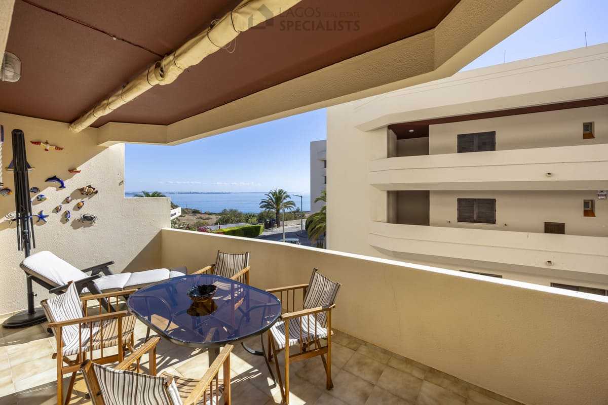 Sunny terrace with outdoor dining set and sea view - Iberlagos apartment, Lagos