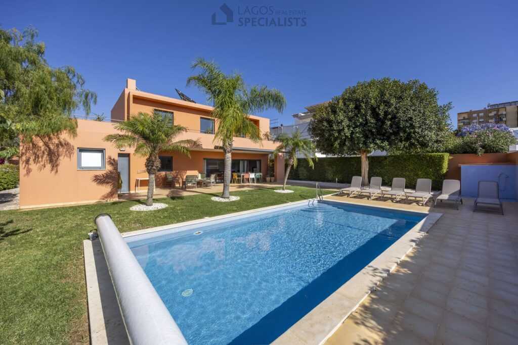 Spacious backyard with palm trees and swimming pool, Lagos property