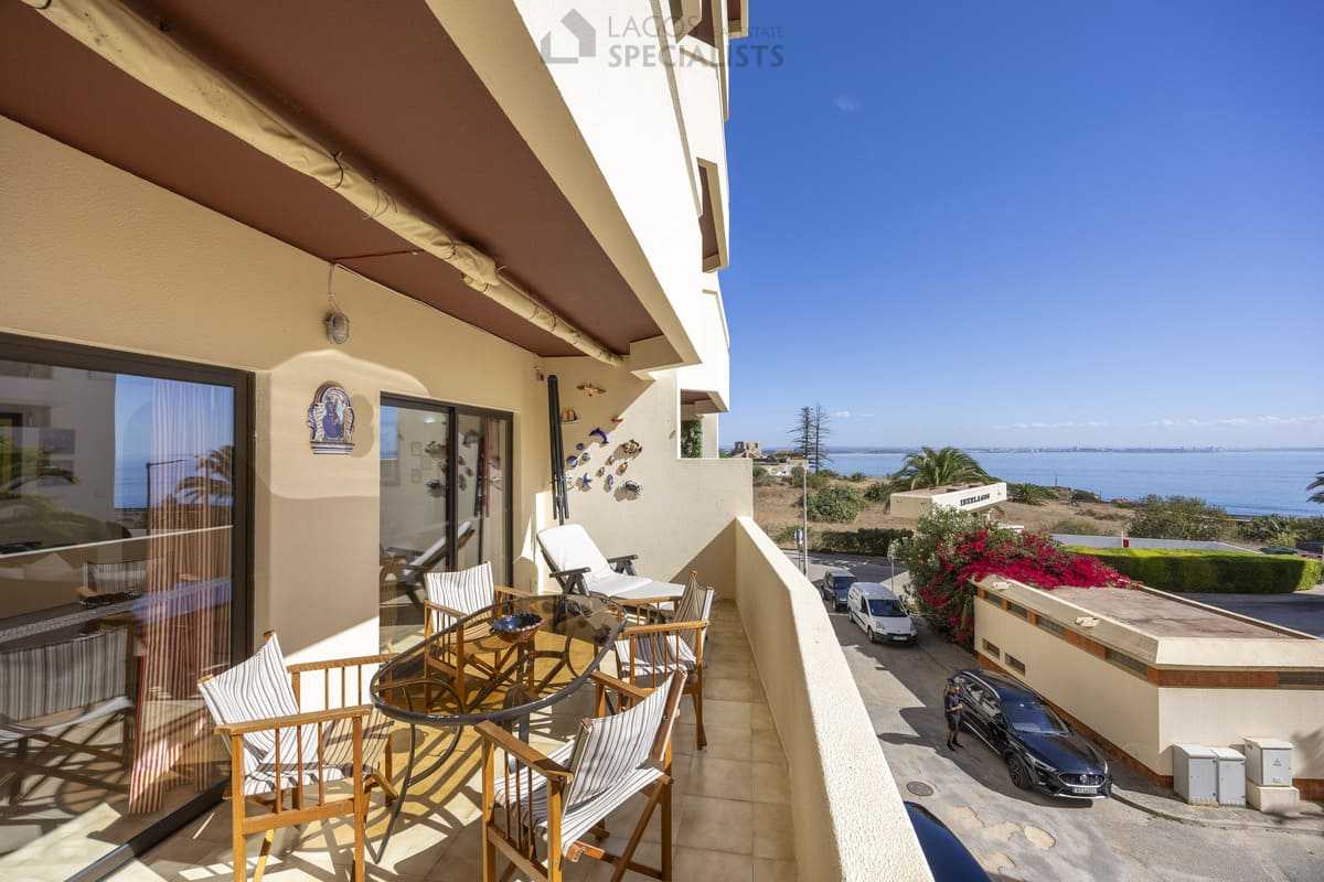Balcony with sea outlook over street and bougainvillea - Iberlagos, Lagos