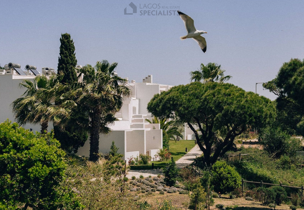 Landscaped gardens overlooking the ocean at Algarve coastal resort in Olhos d’Água