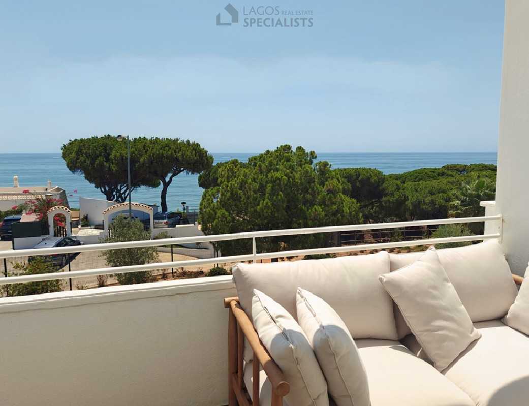 Sea view from private terrace with outdoor sofa at ocean front resort in Olhos d’Água