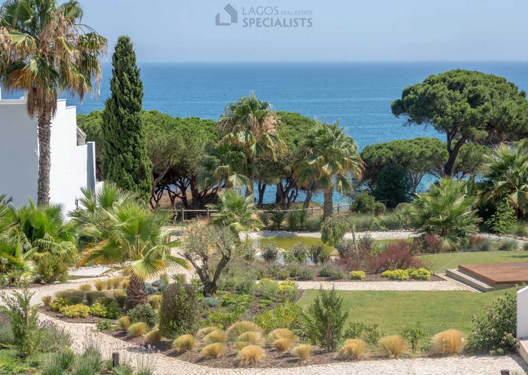Landscaped gardens overlooking the ocean at Algarve coastal resort in Olhos d’Água