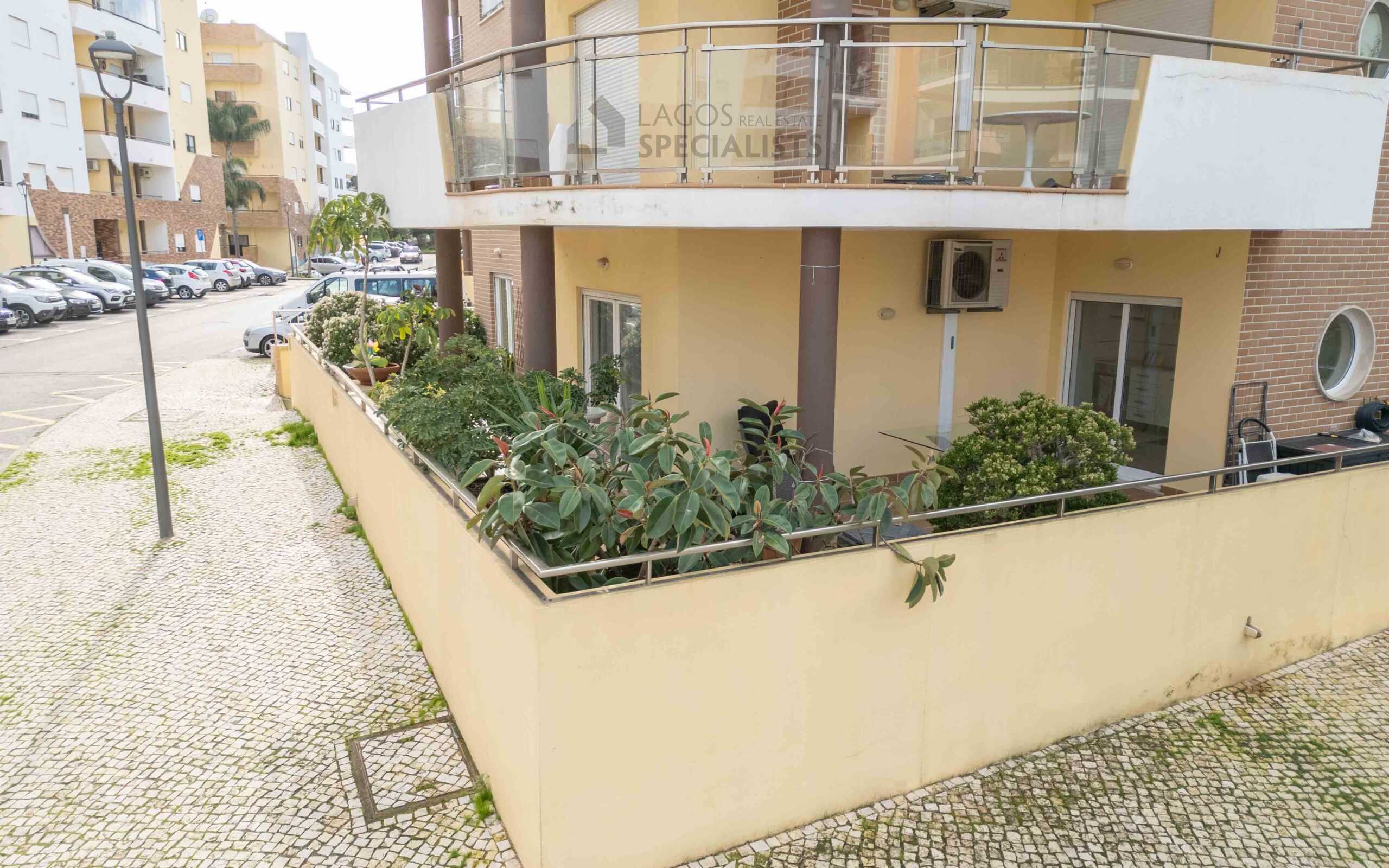 Private ground-floor terrace with plants and outdoor space in modern apartment building in Lagos