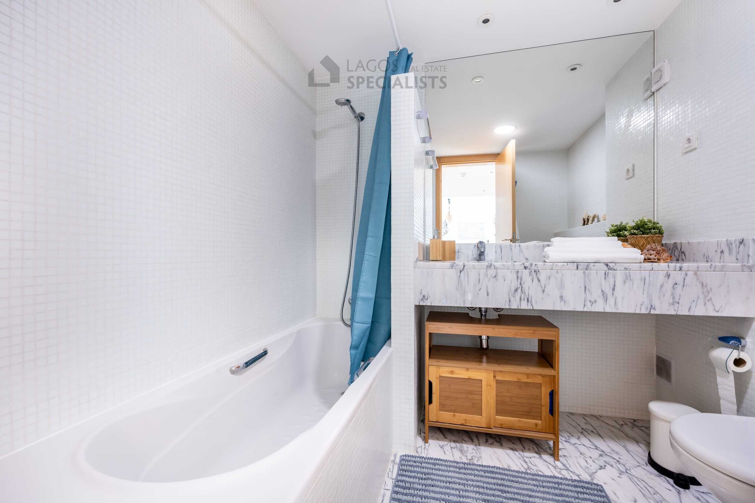 Modern bathroom with marble vanity in Lagos Marina apartment for sale