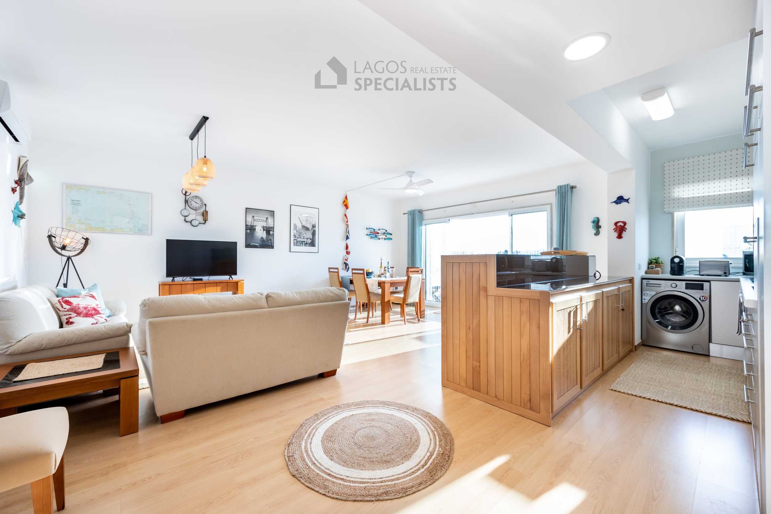 Bright open plan living and dining area in premium Lagos Marina apartment