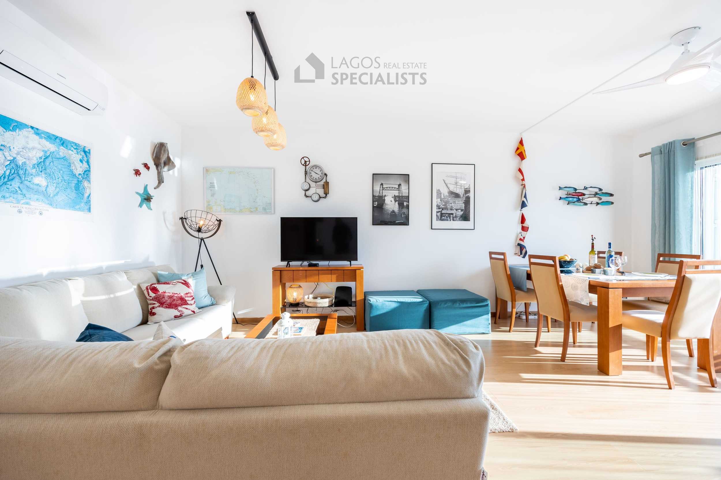 Bright open plan living and dining area in premium Lagos Marina apartment