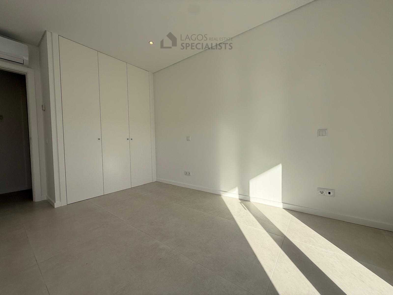 Master bedroom with built-in closets