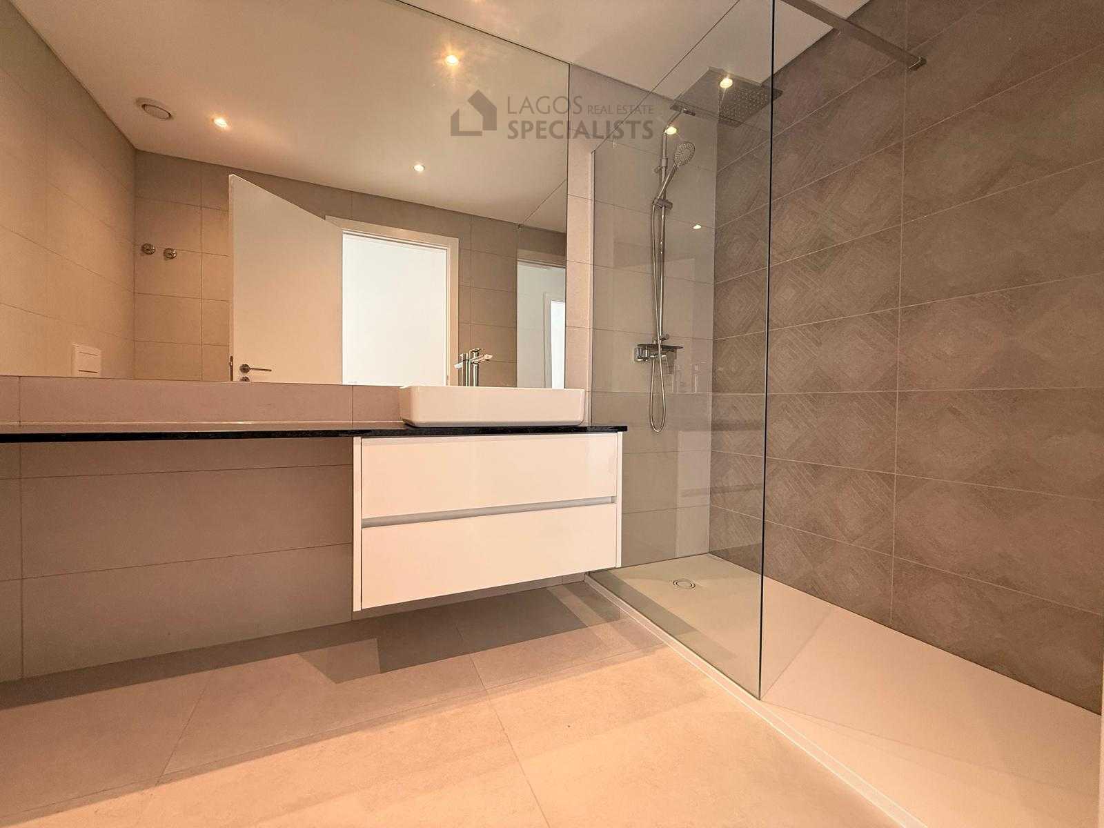 Modern bathroom with walk-in shower