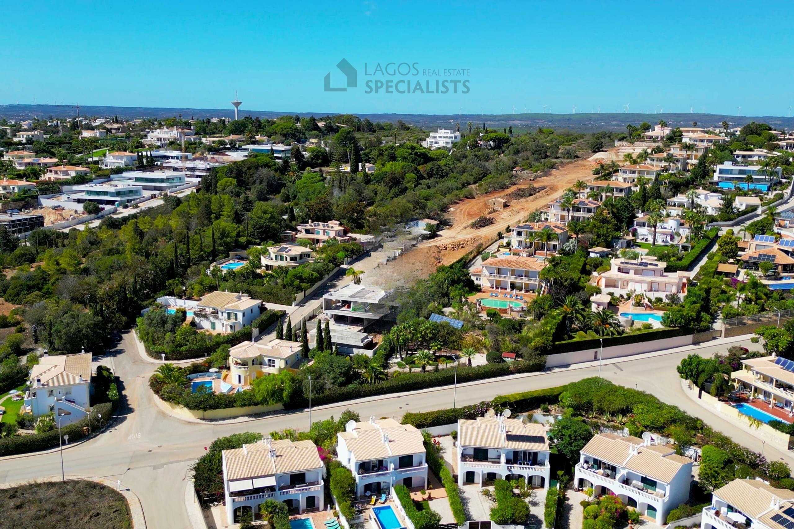 Aerial view of established villas and residential streets near Praia da Luz in Algarve