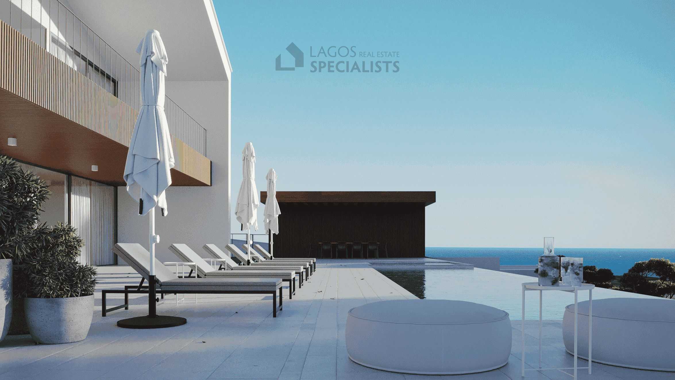 Render of south-facing building plot Praia da Luz showing pool terrace with sun loungers and Atlantic ocean views