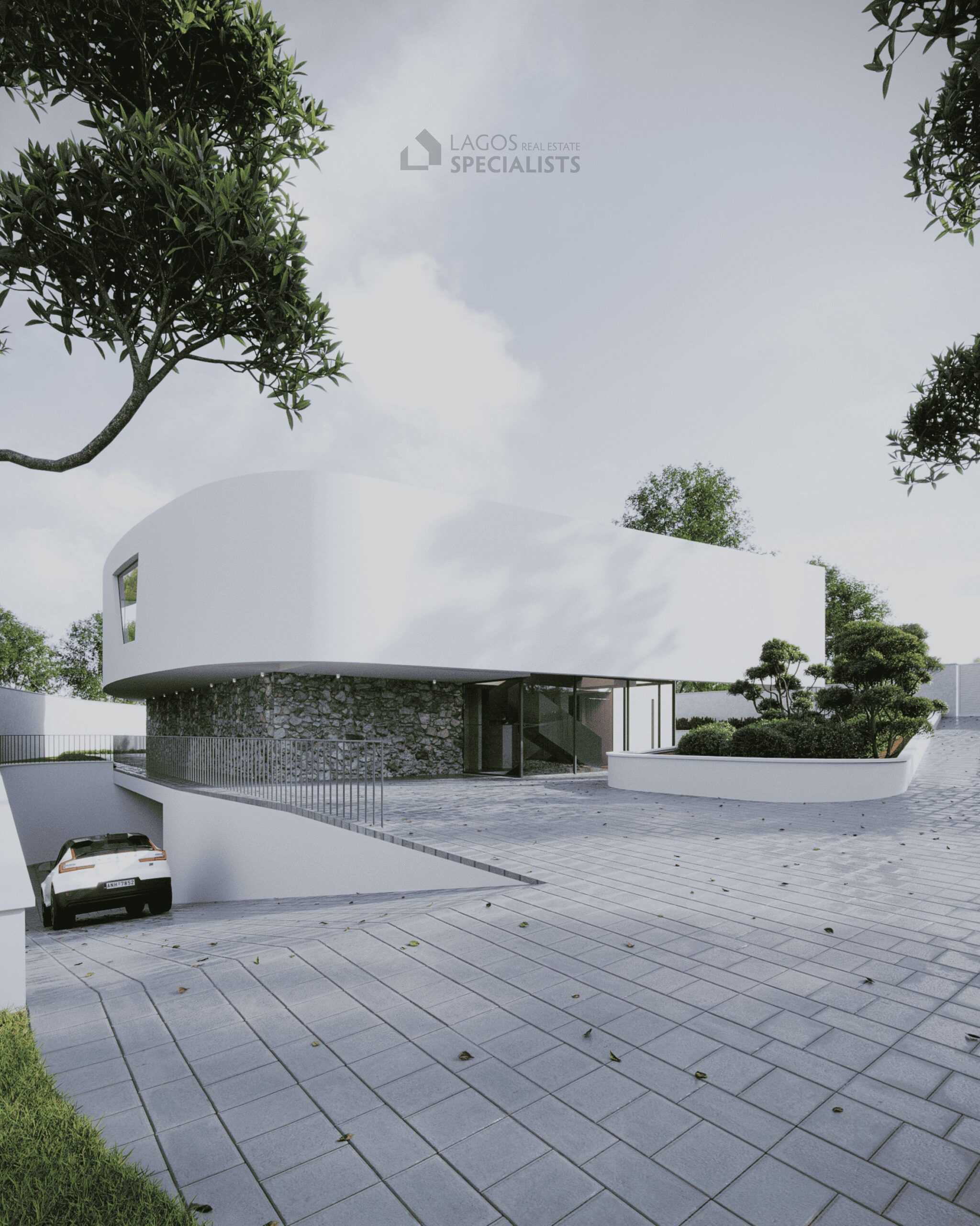 Exterior render of building plot Praia da Luz showing curved contemporary villa with stone detail and landscaped entrance